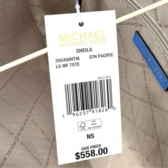 Michael Kors Bag Large Sheila Mf Tote Bag
South Pacific Blue - Picture 11 of 11